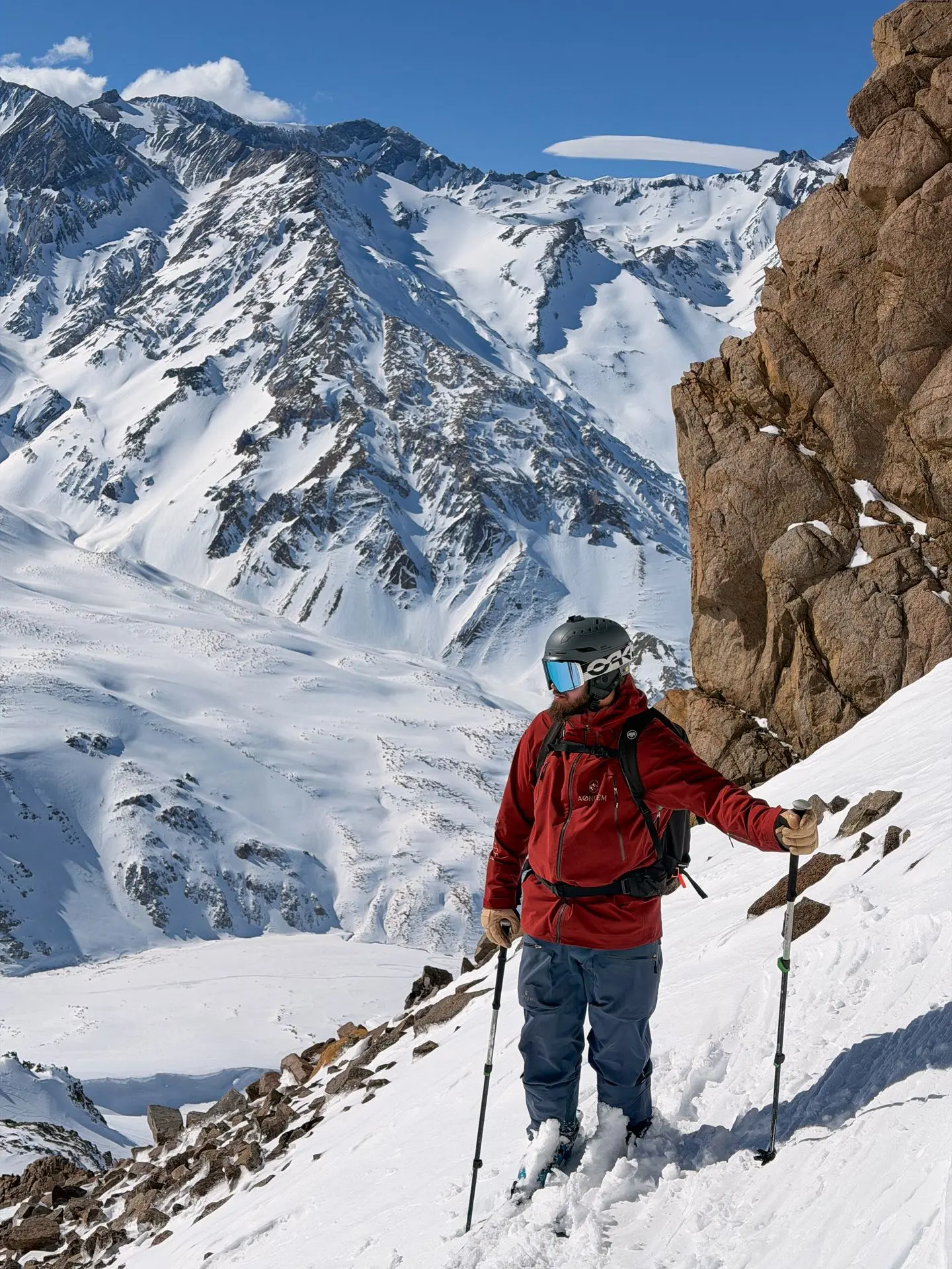 Portrait skier on top of mountain Freeriding